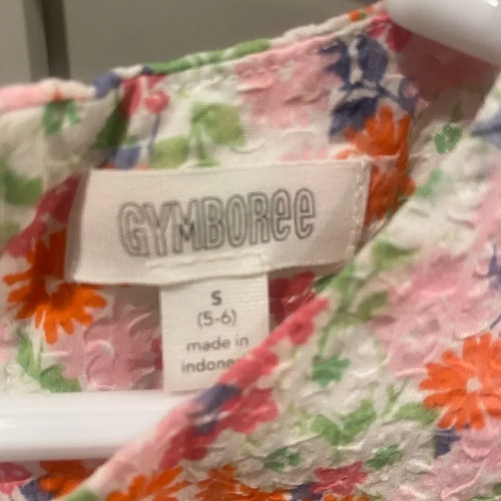 Gymboree Girl’s dress. Ruffle sleeves. Orange, pink and purple colors